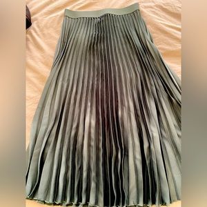 Pleated green skirt